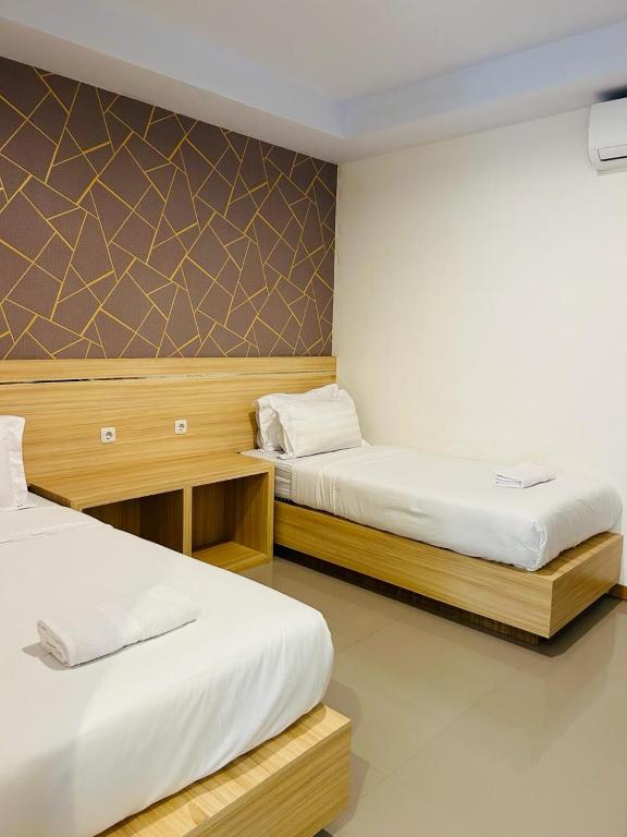 Wisma Sidapore teluk bayur Salakan